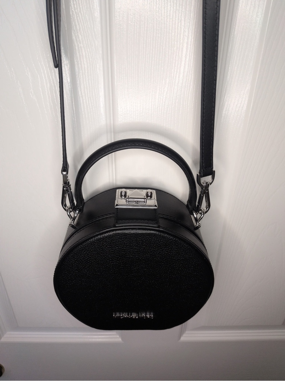 Flawless Michael Kors Black Round Crossbody with Top Handle and Adjustable Strap